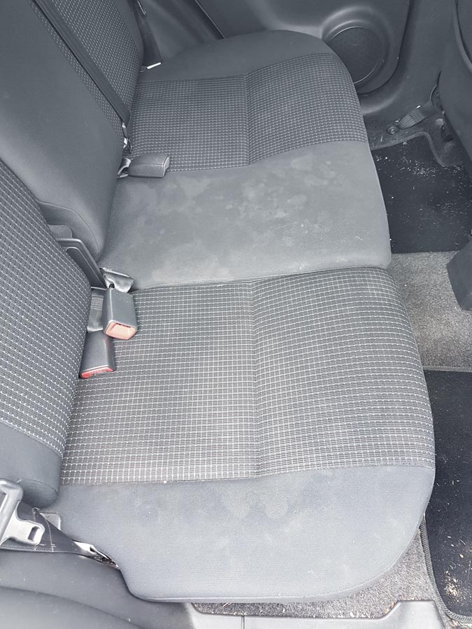 Fabric rear car seat before cleaning Car seat cleaning in Brighton - before